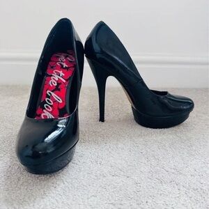 Sleek Black High Heels by Pleaser